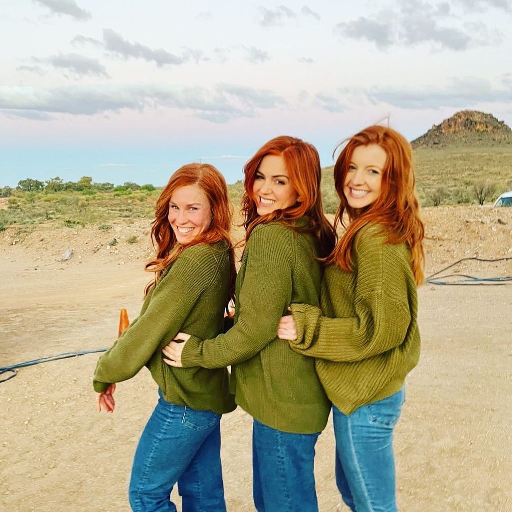 Isla Fisher poses with her stunt doubles