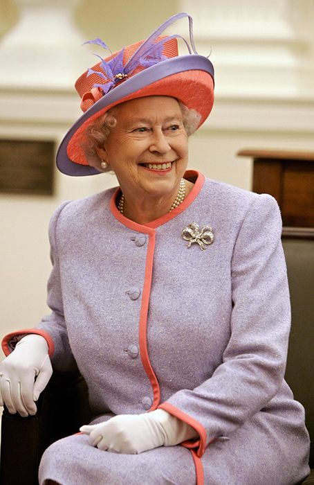 the queen wearing white gloves