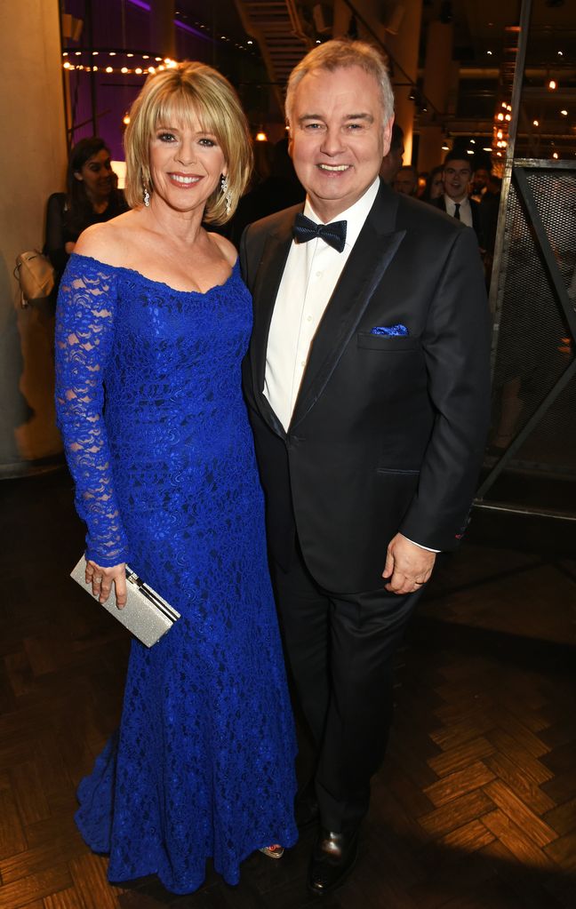 Ruth Langsford in a blue dress alongside Eamonn Holmes in a tuxedo