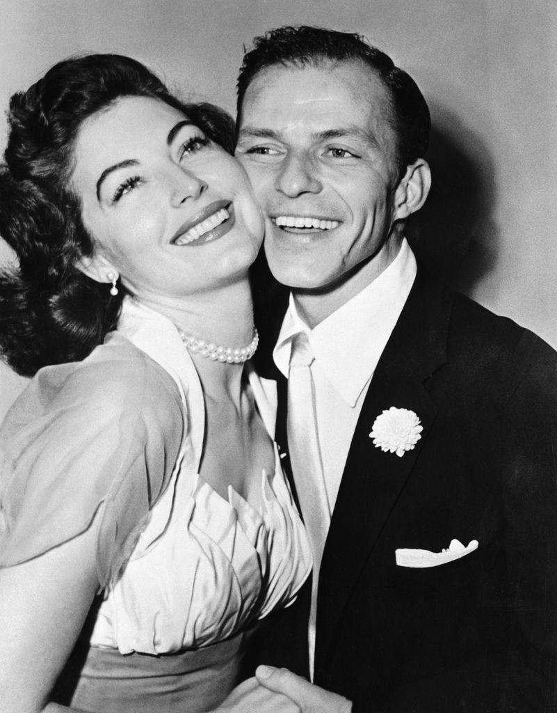 (Original Caption) 11/8/1951-Philadelphia, PA: Crooner Frank Sinatra and his bride Ava Gardner pose for a wedding picture following their marriage last night at Germantown, PA., home of Lester Sachs. The double ring ceremony was performed by Judge Joseph Sloane.