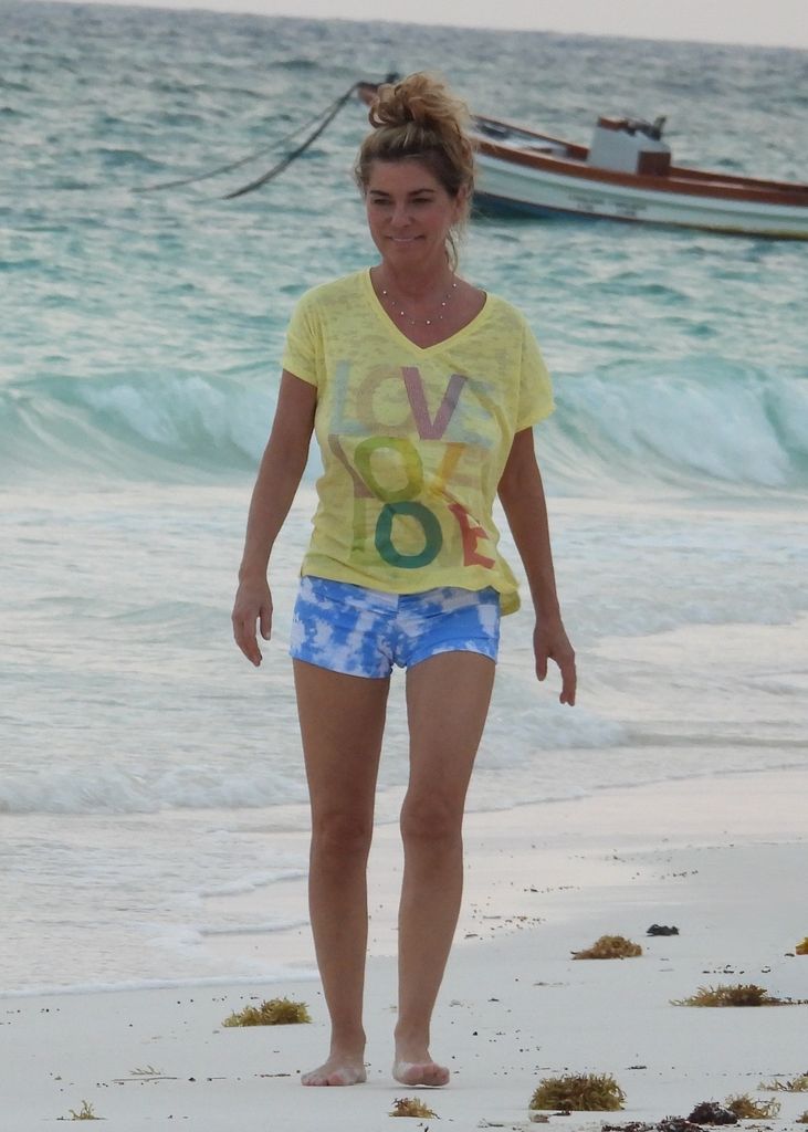 shania twain walking beach in tulum mexico