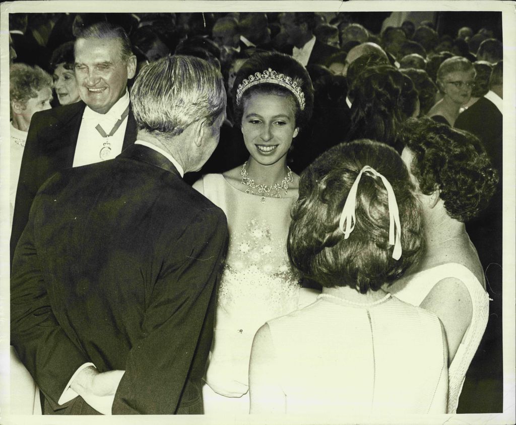 Princess Anne talking to group in 1970 wearing tiara
