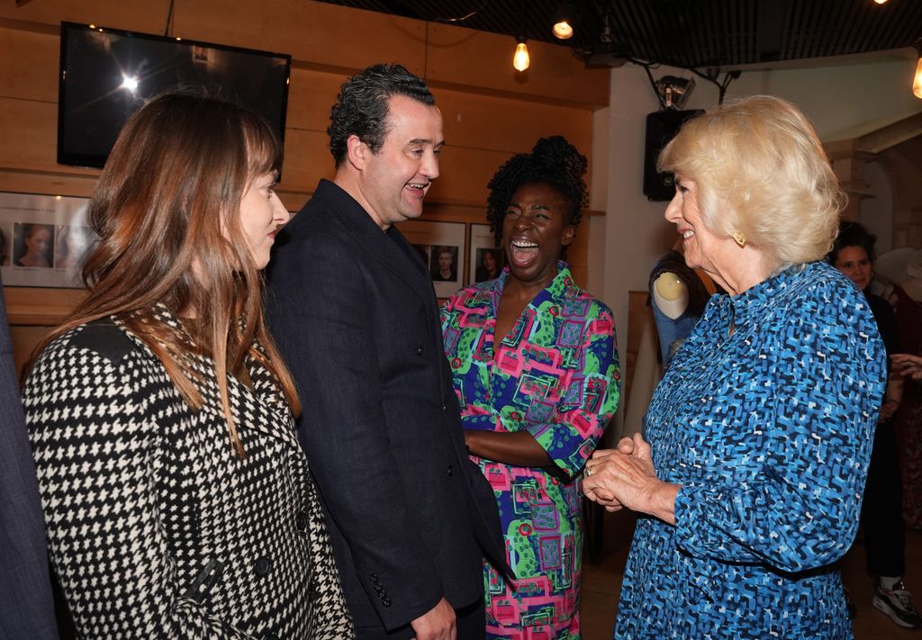 Queen Camilla speaking to actor, Daniel Mays, at RADA