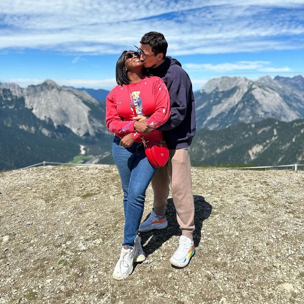 Motsi and Evgenij kissing on a mountaintop