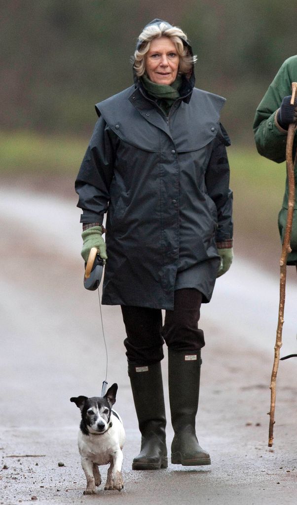 Queen Consort Camilla Walks With Friends in the rain