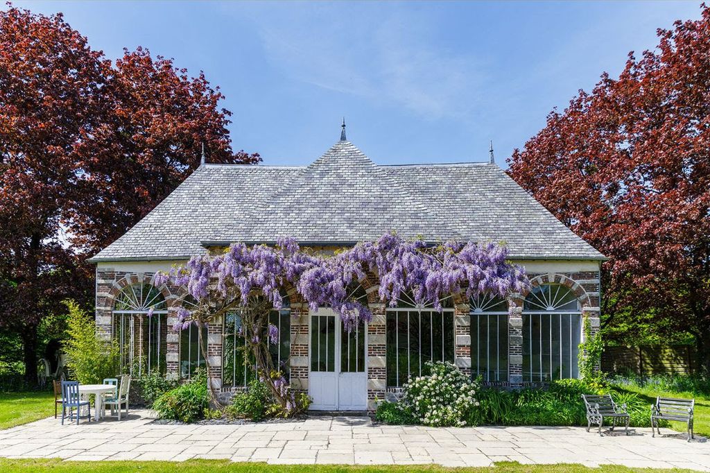 orangery with wisteria outside
