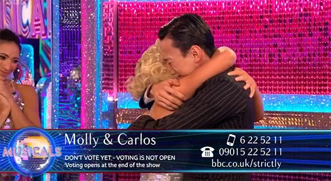 molly and carlos cry and hug after getting scores
