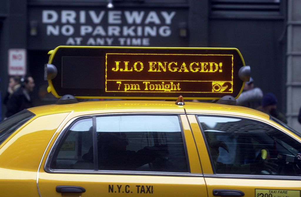 A New York City taxi advertising the engagement of singer Jennifer Lopez and actor Ben Affleck is shown November 6, 2002 in New York City