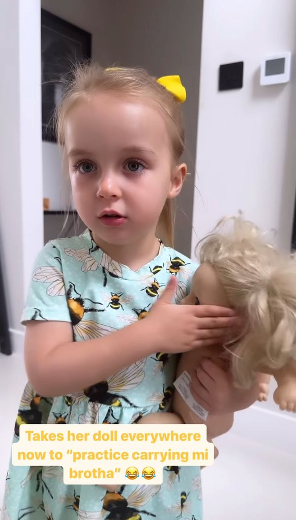 Gemma Atkinson's daughter Mia holding a doll
