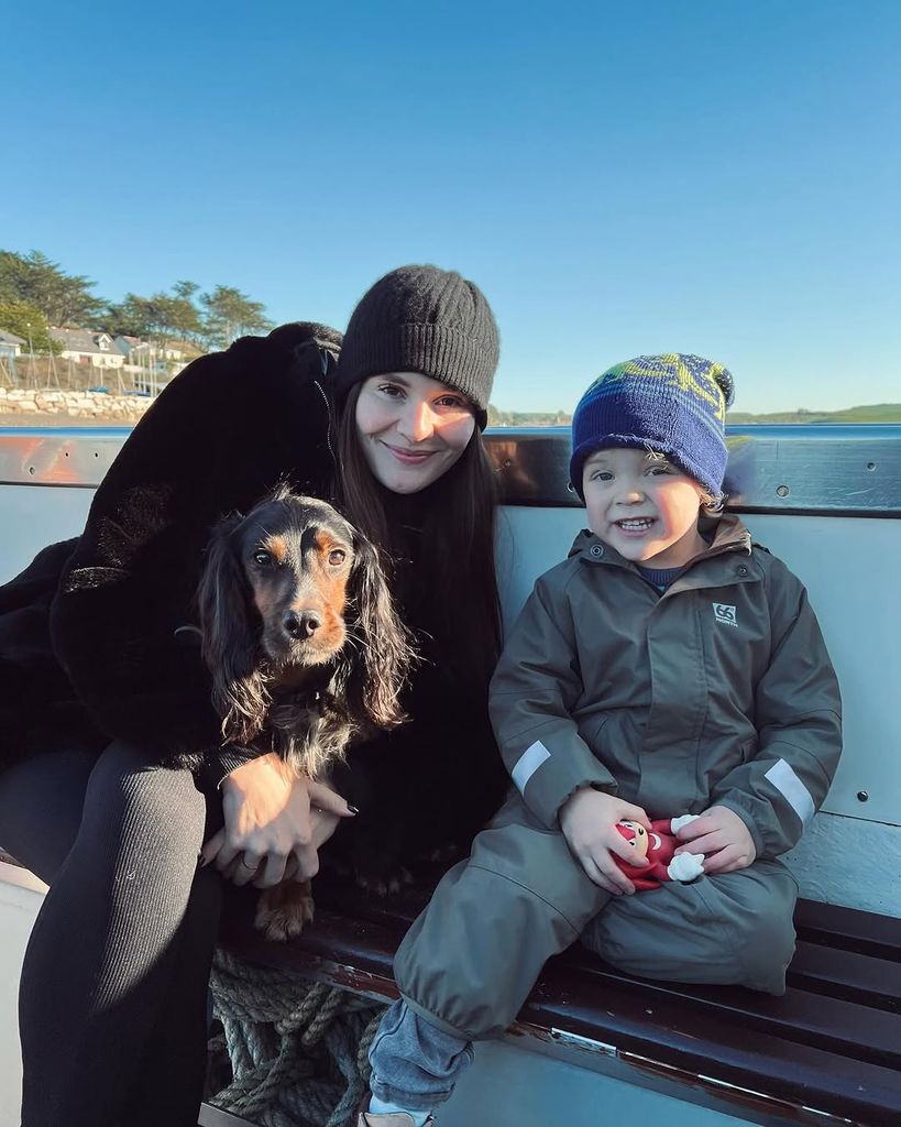 Adam Peaty with Holly Ramsay and his son George