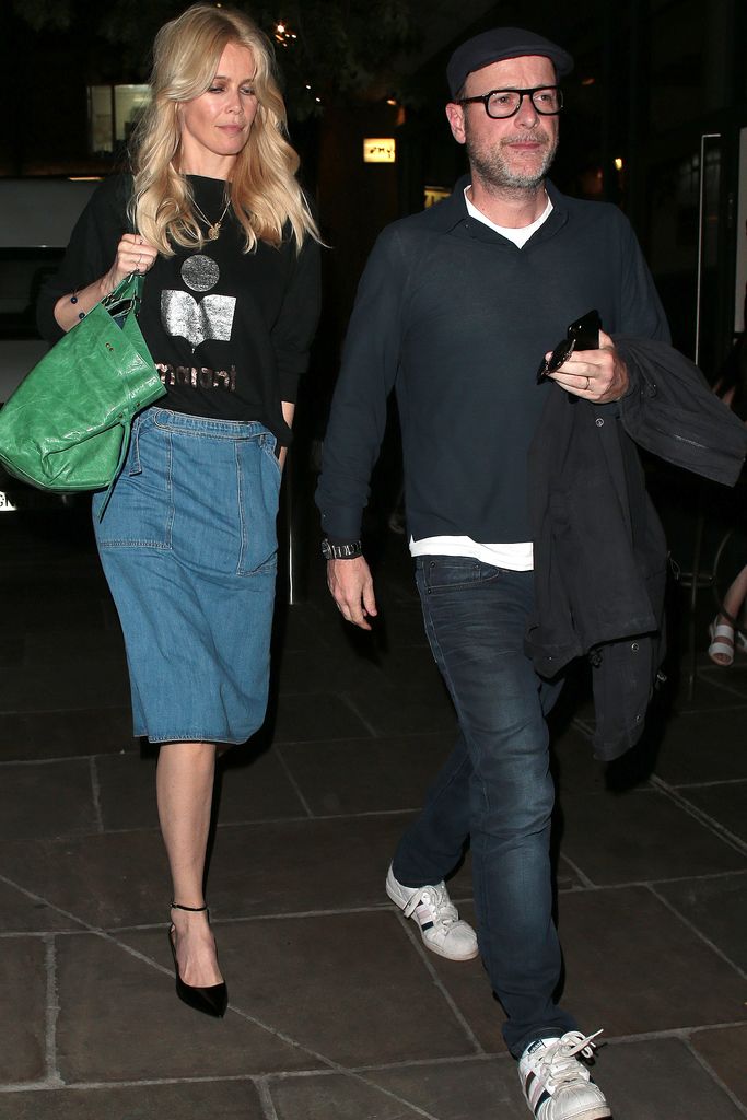 Claudia Schiffer in a denim skirt and black top on a date night with her husband Matthew Vaughn