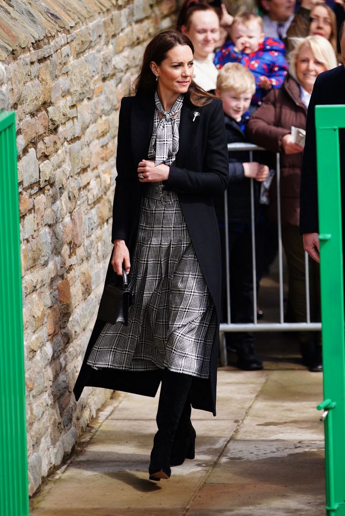 Princess Kate wore a subtle monochrome look fitting for the occasion  