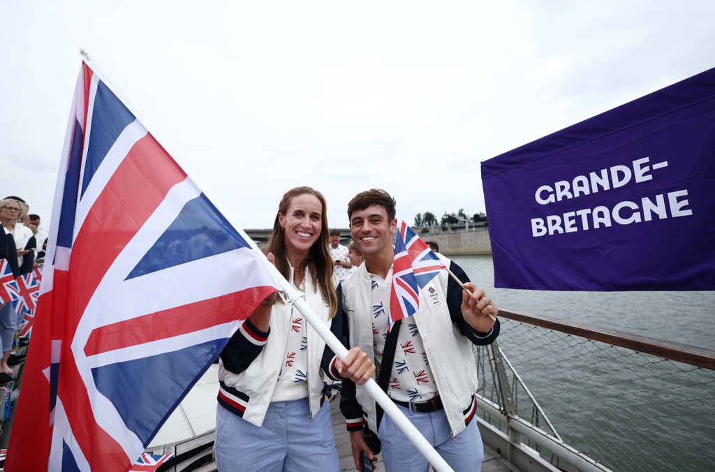 Helen Glover, Flagbearer of Team Great Britain, poses for a photograph with Thomas Daley, Flagbearer of Team Great Britain