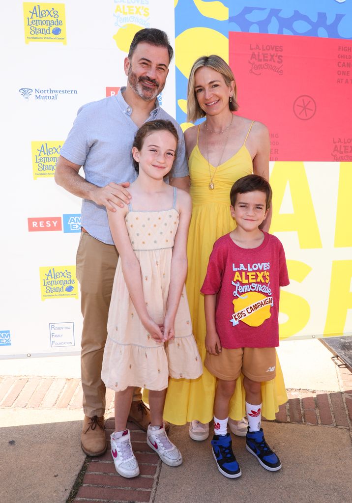 Jimmy posing with Molly and his kids