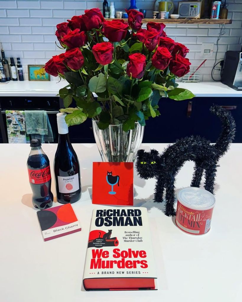 richard osman's kitchen with book and gifts 