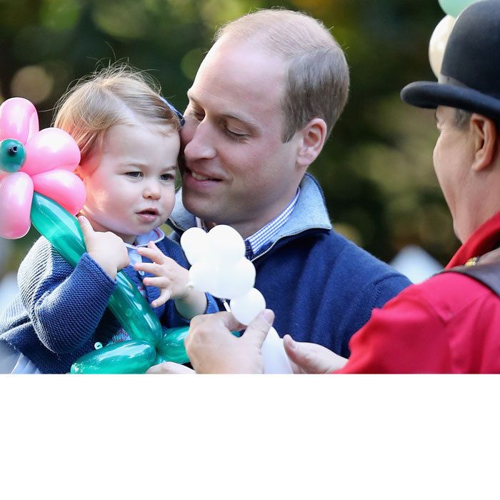 prince william holding princess charlotte