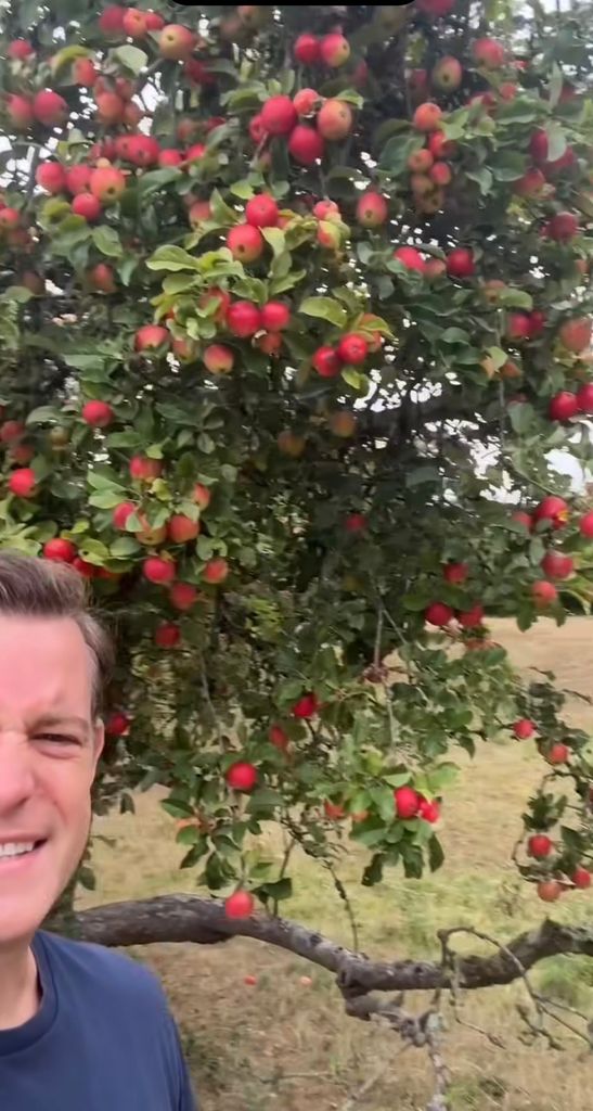 Matt Baker in front of apple tree