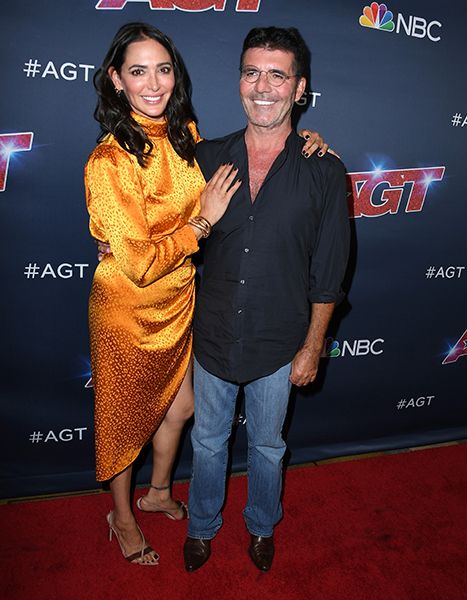 simon cowell and lauren silverman on red carpet
