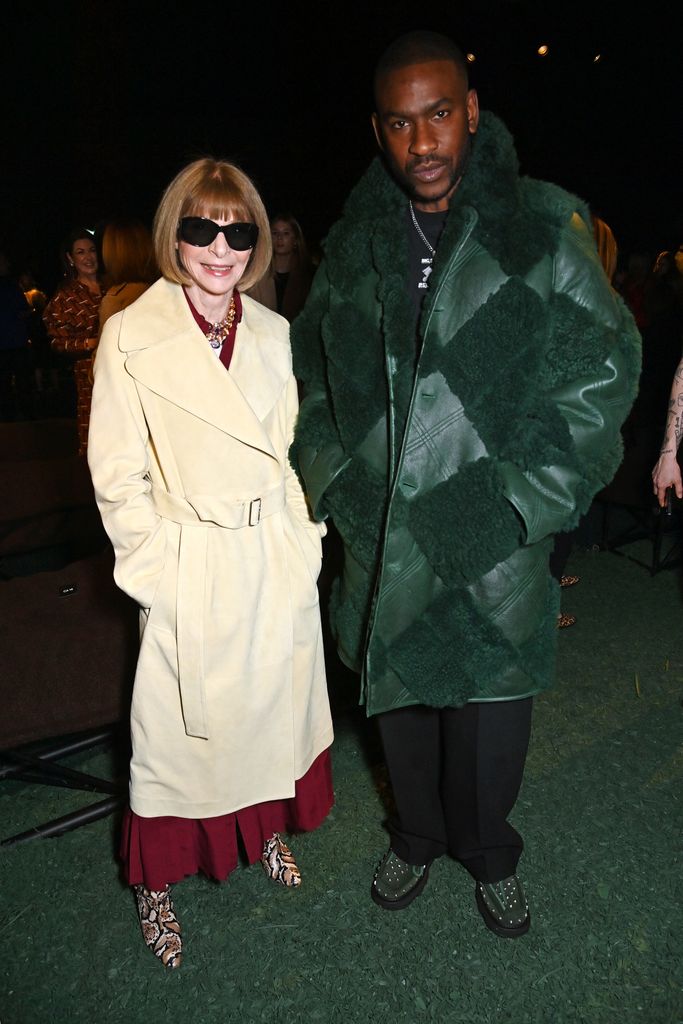 LONDON, ENGLAND - FEBRUARY 19: Dame Anna Wintour and Skepta attend the Burberry Winter 2024 show during London Fashion Week on February 19, 2024 in London, England. (Photo by Dave Benett/Getty Images for Burberry)
