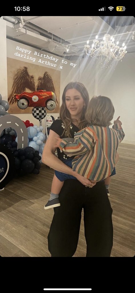 Ellie Goulding holding son Arthur