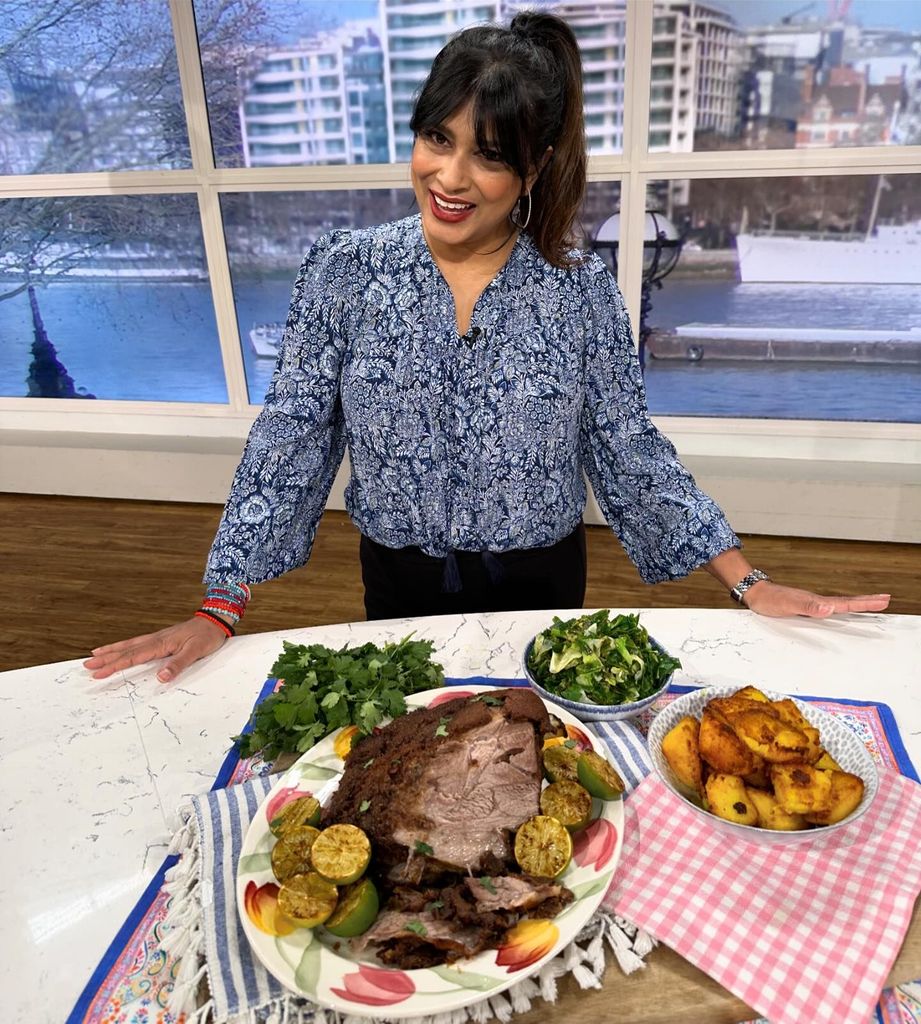 Nisha on This Morning with plates of food