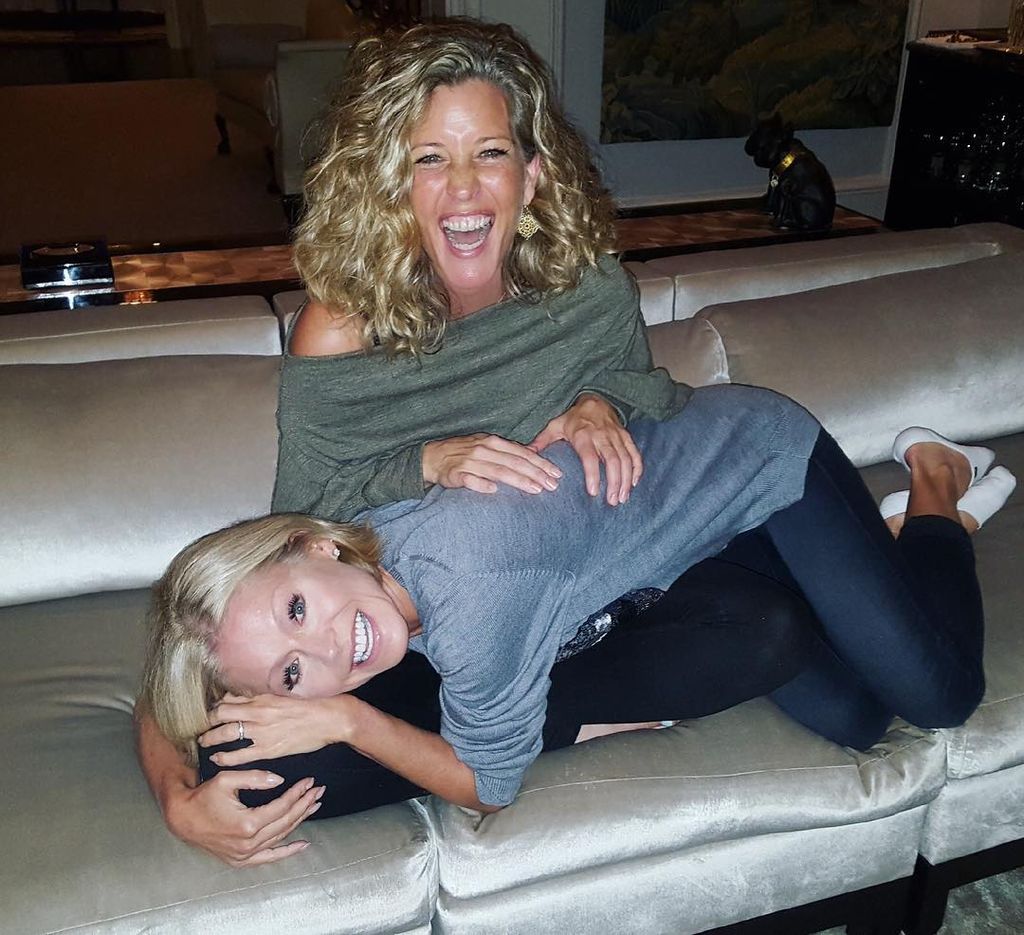 Kelly Ripa lies on Laura Wright's lap on New Year's Eve 2017