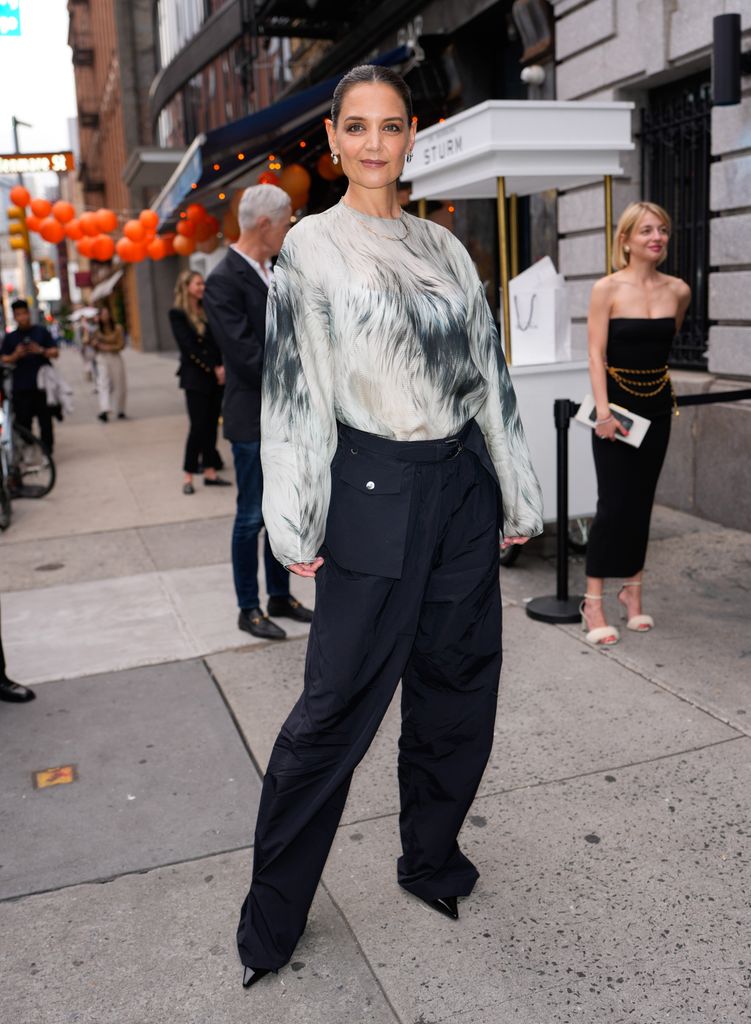 Katie Holmes in a semi-sheer top