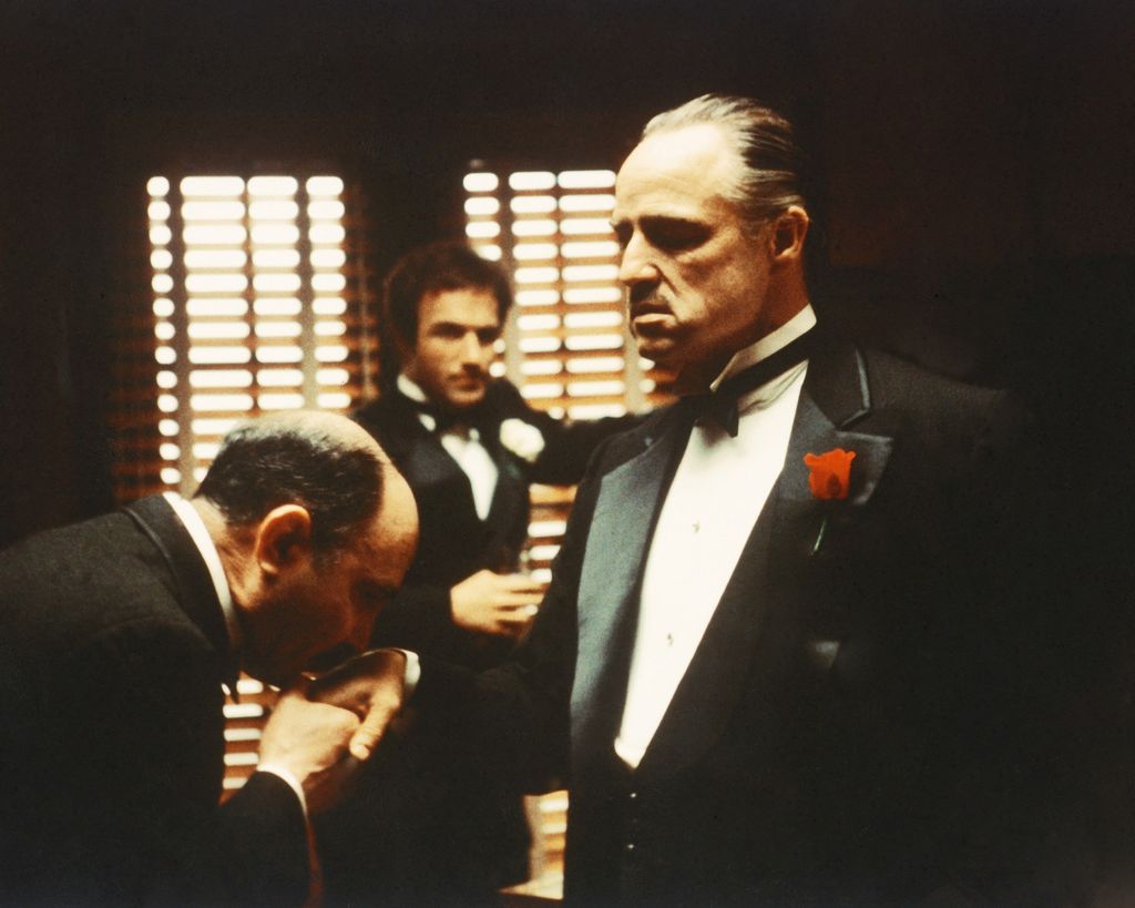 left to right, Salvatore Corsitto as Bonasera, James Caan as Santino 'Sonny' Corleone and  Marlon Brando (1924 - 2004) as Don Vito Corleone in 'The Godfather', 1972