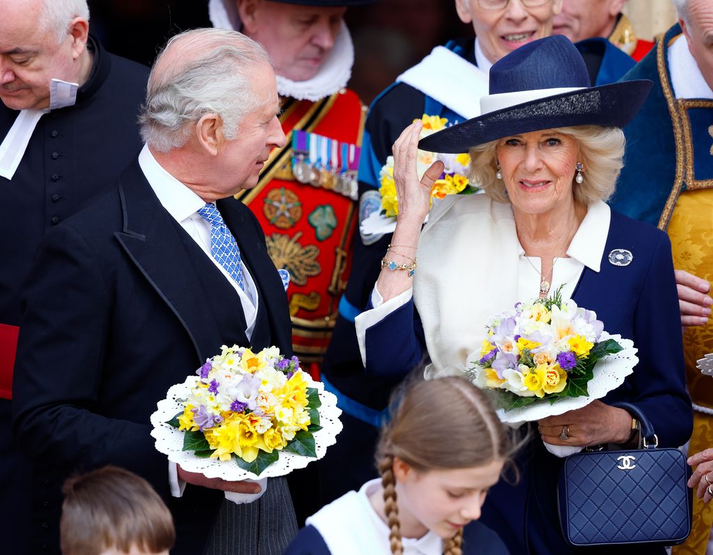 Queen Camilla carrying a navy blue Chanel handbag