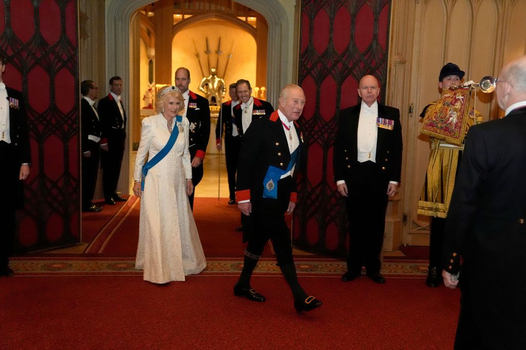 The Queen wore a white embellished gown