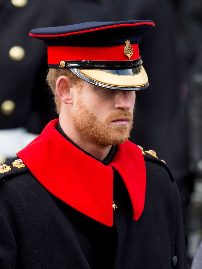 Prince Harry in his military uniform looking serious