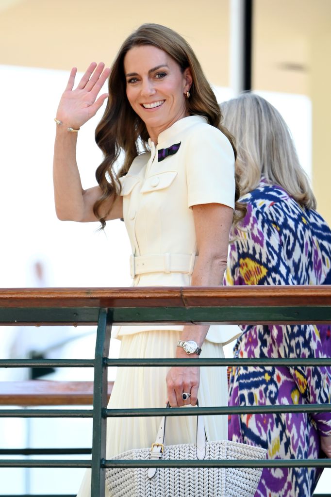 Catherine, Princess of Wales waves from bridge