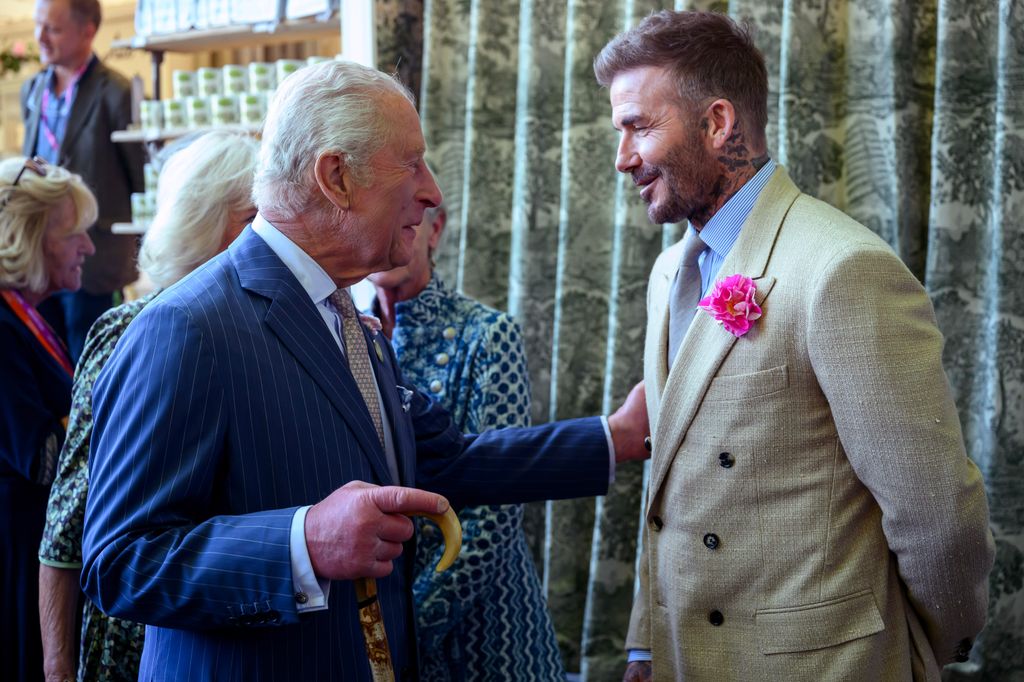 King Charles talking to David Beckham