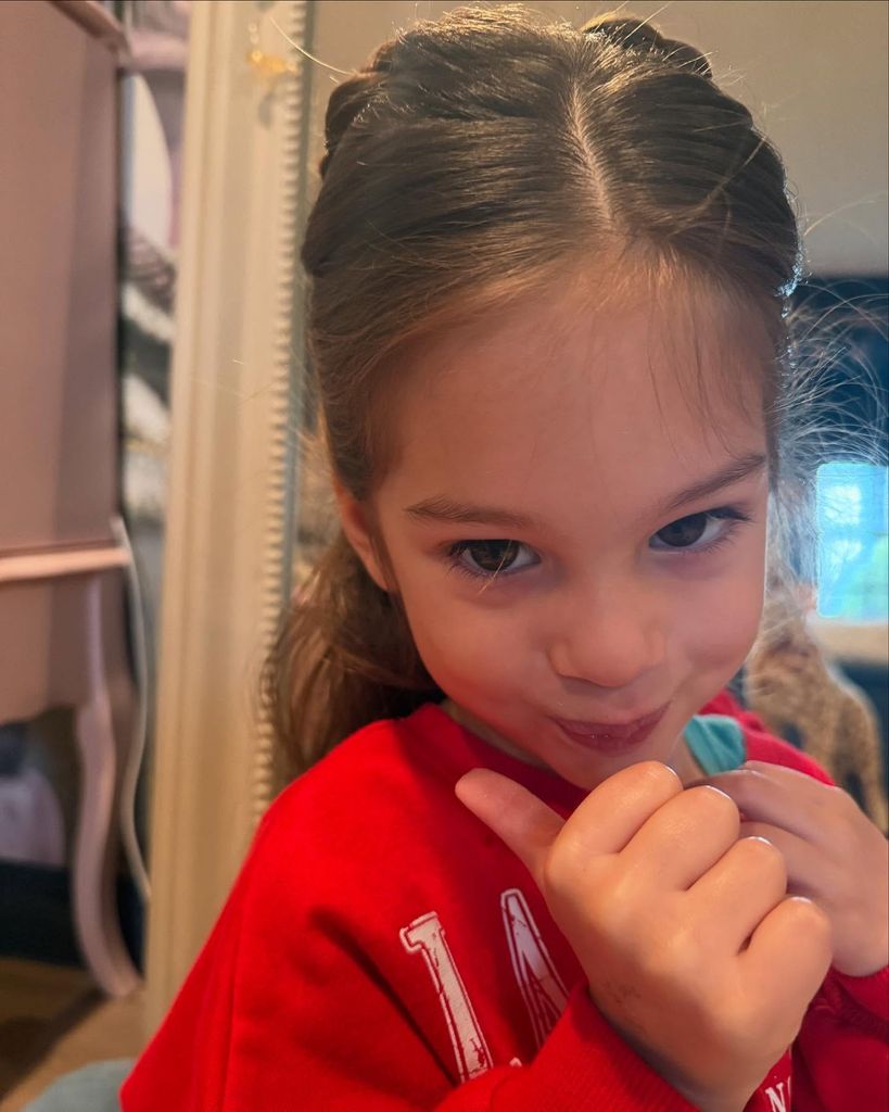 wilmer valderrama and amanda pacheco daughter smiling for camera