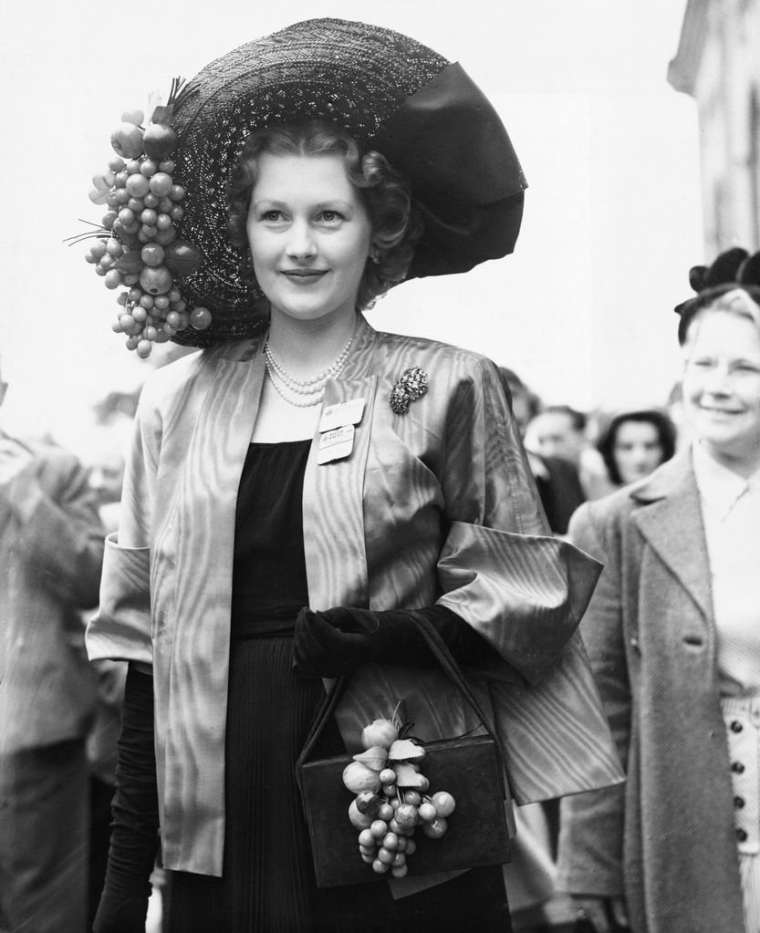 Mrs. Gerald Legge, later Countess Spencer, and stepmother to Diana, Princess of Wales, wears a large hat decorated with cherries at Ascot. (Photo by Â© Hulton-Deutsch Collection/CORBIS/Corbis via Getty Images)