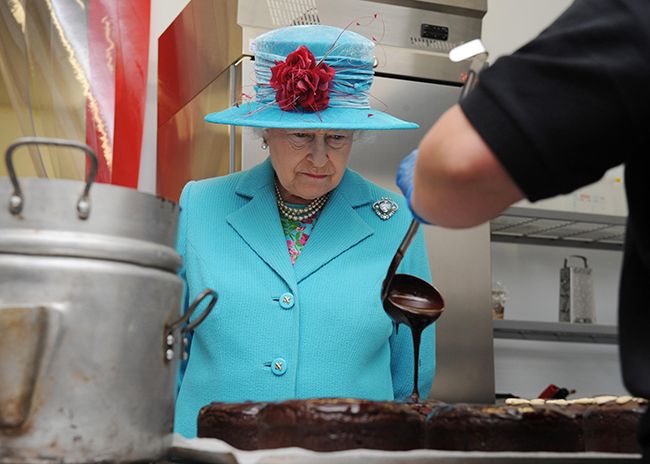queen looking at chocolate cake
