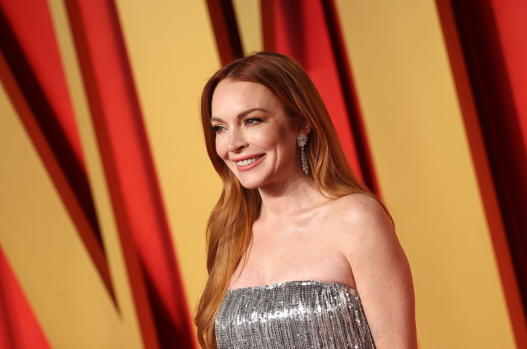 BEVERLY HILLS, CALIFORNIA - MARCH 10: Lindsay Lohan attends the 2024 Vanity Fair Oscar Party Hosted By Radhika Jones at Wallis Annenberg Center for the Performing Arts on March 10, 2024 in Beverly Hills, California. (Photo by Amy Sussman/Getty Images)