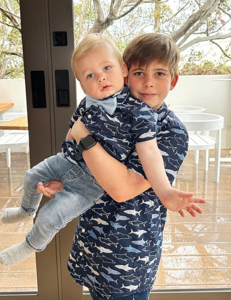 Photo shared by Heather Rae El Moussa on Instagram Easter Sunday of Christina Hall's son Brayden carrying his half-brother Tristan
