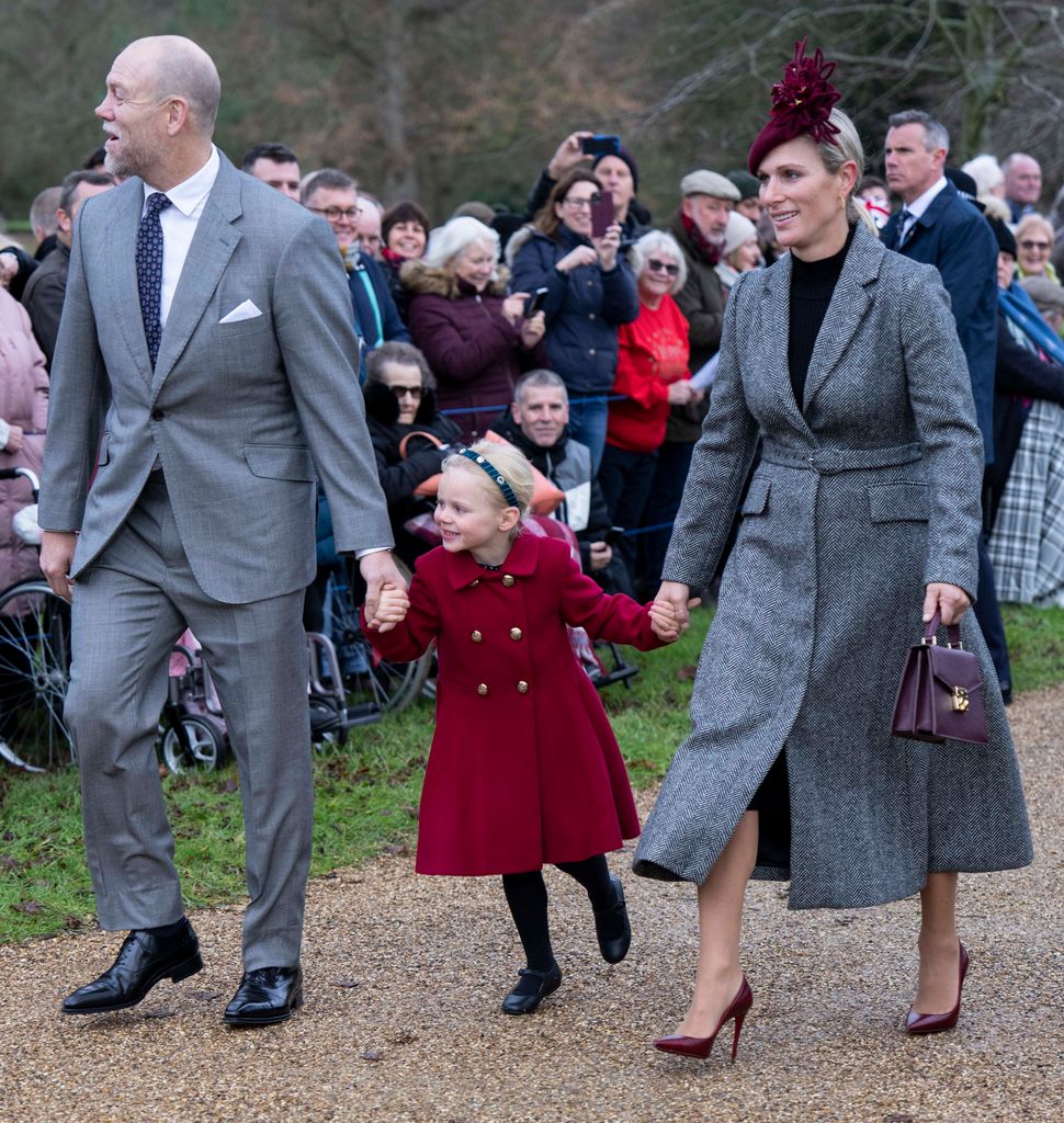  Zara Tindall and Mike Tindall with Lena Tindall attend the Christmas Day service 