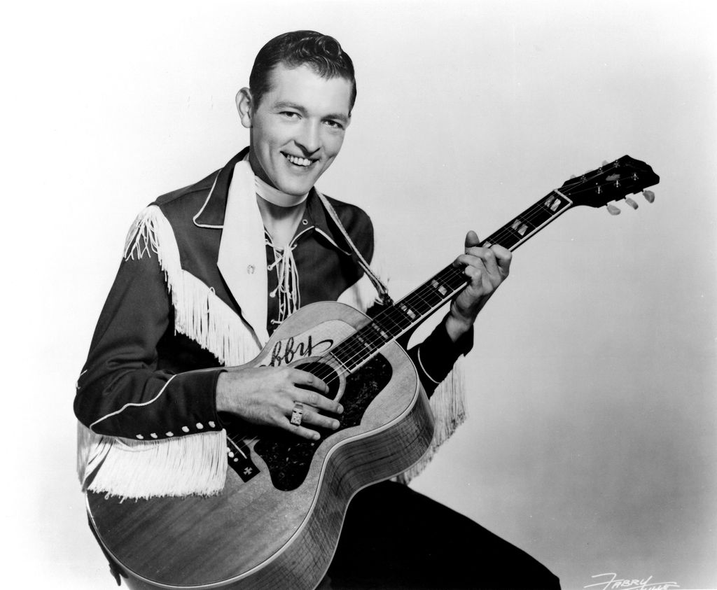 CIRCA 1957:  Country singer Bobby Helms poses for a portrait hoolding an acoustic guitar in circa 1957. (Photo by Michael Ochs Archives/Getty Images)