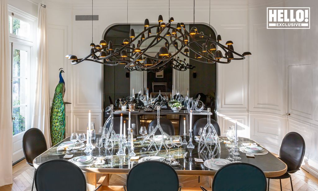 Tyler Ellis amazing modern dining room with black accents and gothic chandelier 