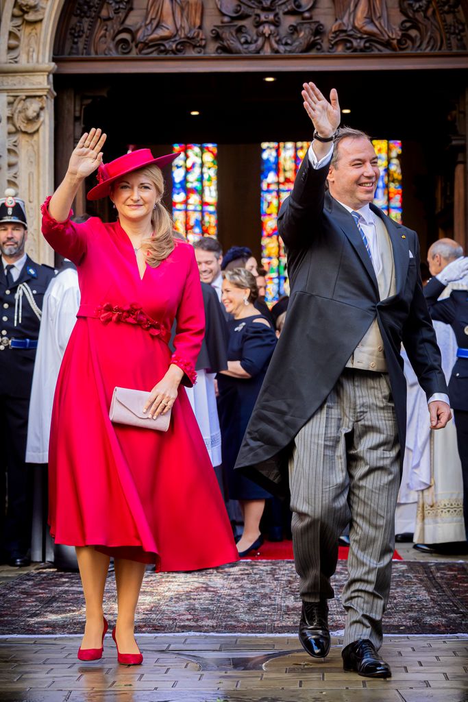 Grand Duchess Stephanie and Grand Duke Guillaume waving outside cathedral