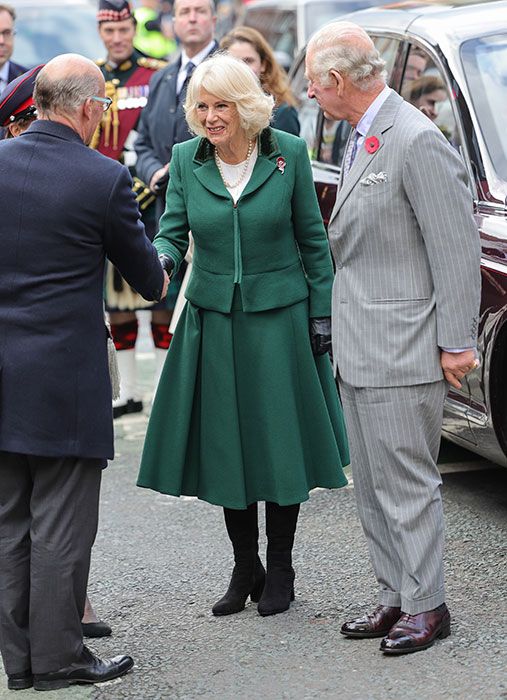 King Charles and Queen Consort Camilla with a dignitary 