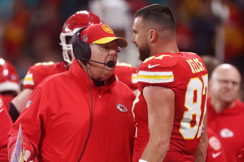 FRANKFURT AM MAIN, GERMANY - NOVEMBER 05: Head coach Andy Reid of the Kansas City Chiefs speaks with Travis Kelce #87  during the NFL match between Miami Dolphins and Kansas City Chiefs at Deutsche Bank Park on November 05, 2023 in Frankfurt am Main, Germany. (Photo by Alex Grimm/Getty Images)