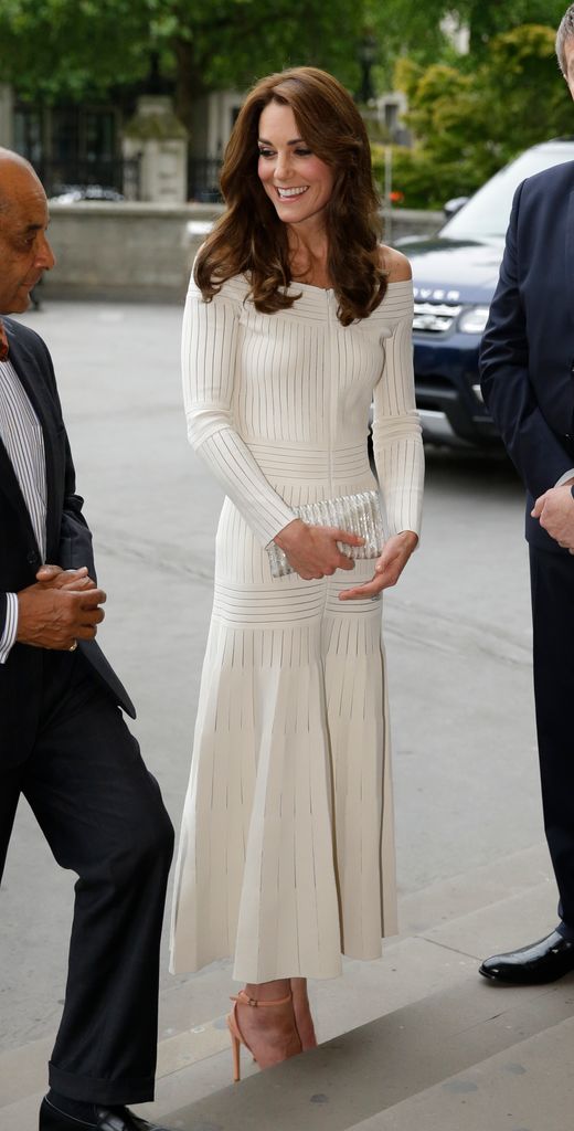 Kate Middleton wearing a white, off-the-shoulder dress as she arrives to present the Art Fund Museum of the Year 2016 prize at a dinner hosted at the Natural History Museum on July 6, 2016 in London, United Kingdom.