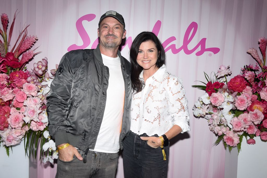 Brian Austin Green and Tiffani Thiessen catch up at the Sandals Foundation event