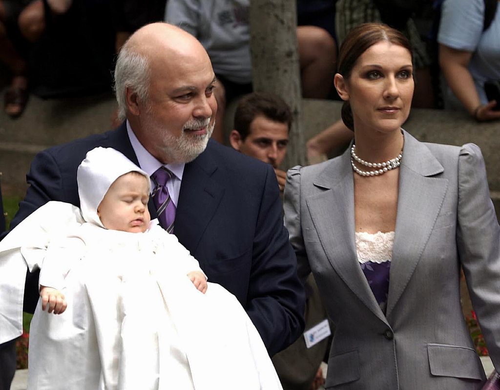 Canadian pop singer Celine Dion and her husband Rene Angelil show off their baby Rene-Charles as they take him to his baptism at the Notre Dame Basilica 25 July in Montreal, Canada. Nearly 2,000 fans had gathered in the square in front of the 170-year-old church, in Montreal's picturesque old quarter. 