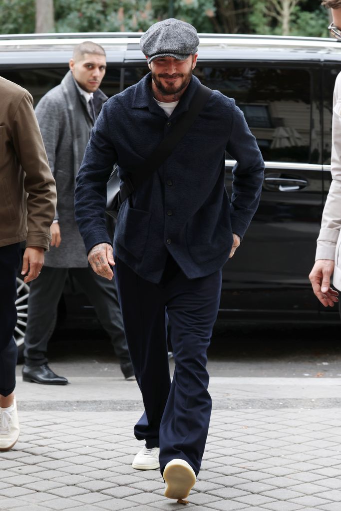 David was snapped in Paris ahead of wife Victoria's runway show