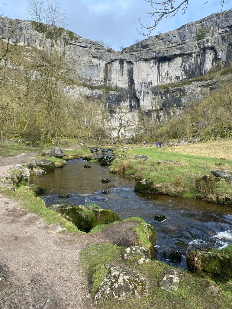 The sun shining on the ethereal Malham Cove