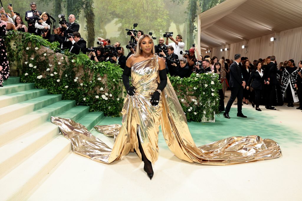 Serena Williams in gold gown featured a long train